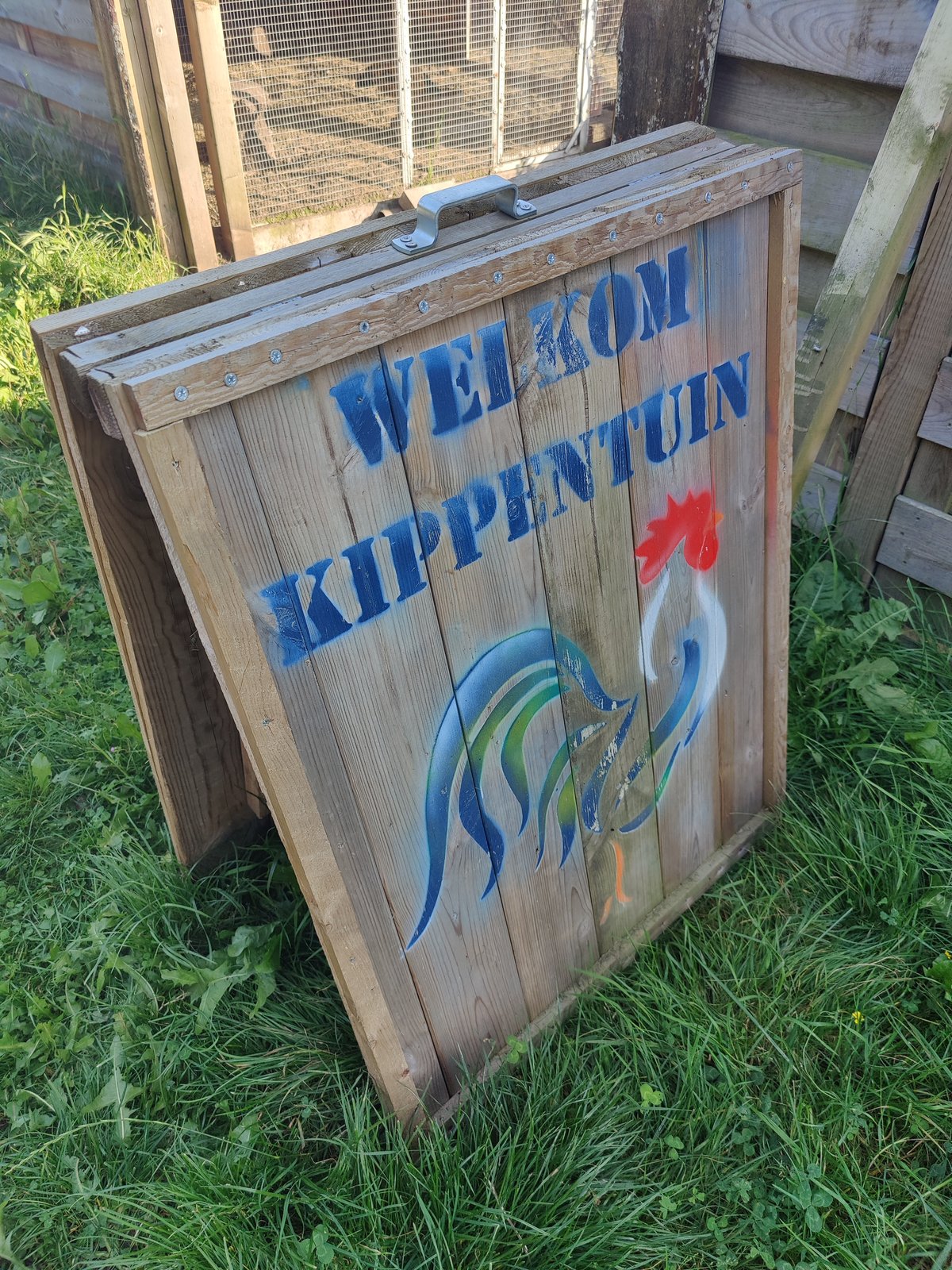 Het houten Kippentuin-bord